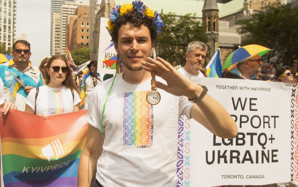 Andrew Kushnir with the We Support LGBTQ+ Ukraine community group at the 2022 Toronto Pride Parade. Photo by Fynn Badgley. 
