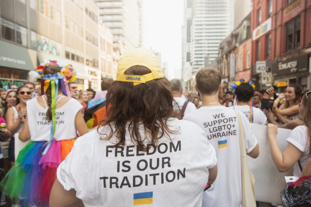 We Support LGBTQ+ Ukraine community group marching in the 2022 Toronto Pride Parade. Photo by Fynn Badgley.