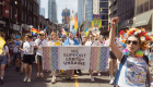 	We Support LGBTQ+ Ukraine community group marching in the 2023 Toronto Pride Parade. Photo by Fynn Badgley.