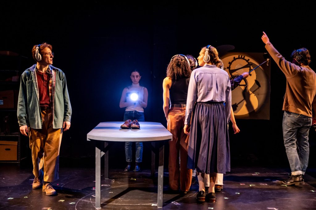 Toronto Metropolitan University/Tarragon Theatre workshop production of The Division, directed by Andrew Kushnir in December 2022. Featuring (L-R) actors Landon Nesbitt, Ella Berger and Manon Bourgeois, with ensemble. Photo by Dahlia Katz.